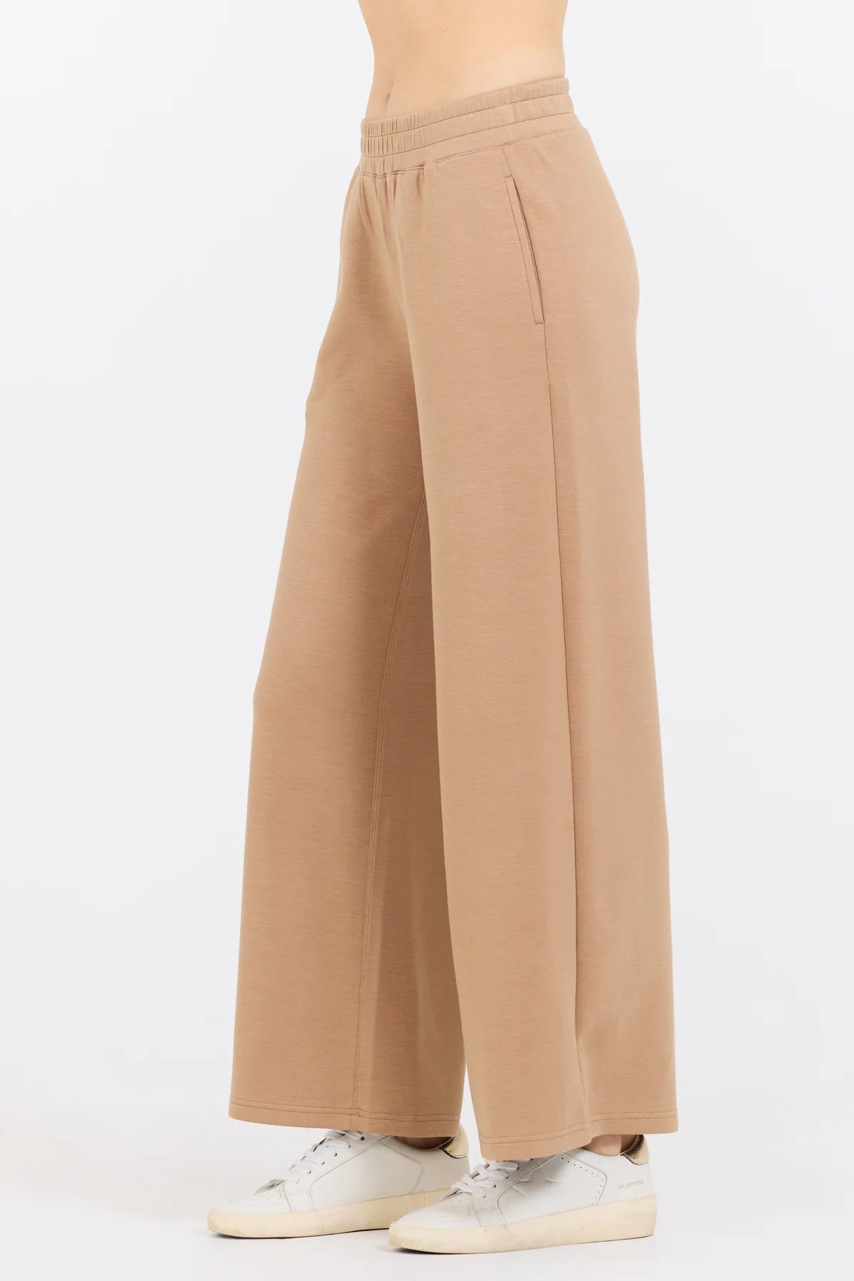 The Caramel Cloud Fleece Flare Pant boasts a blend of Cloud Fleece fabric made from 49% Modal, 45% Polyester, and 6% Spandex for the perfect combination of comfort and stretch.