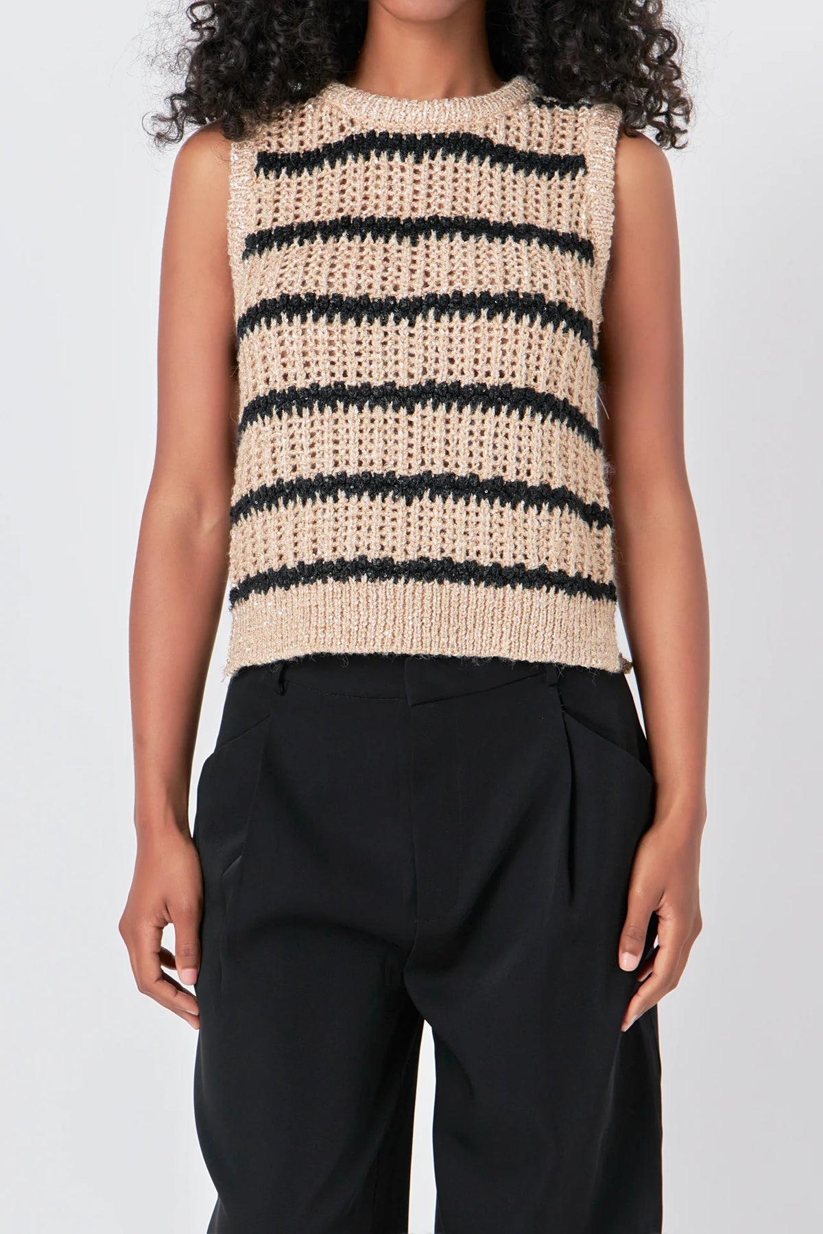 Introducing our Sequins Stripe Knit Top - the perfect addition to your sweater collection. This expertly crafted top features a unique blend of knit and crochet fabric, adding a touch of texture and trendiness. The ribbed neck and stripes give a flattering fit, while the eye-catching sequins steal the spotlight. Don't miss out on this must-have piece for any occasion - shop now and shine bright!
Care Instructions: Hand Wash Cold Do Not Bleach Do not iron Do not dry clean Do not tumble dry
79% Polyester
