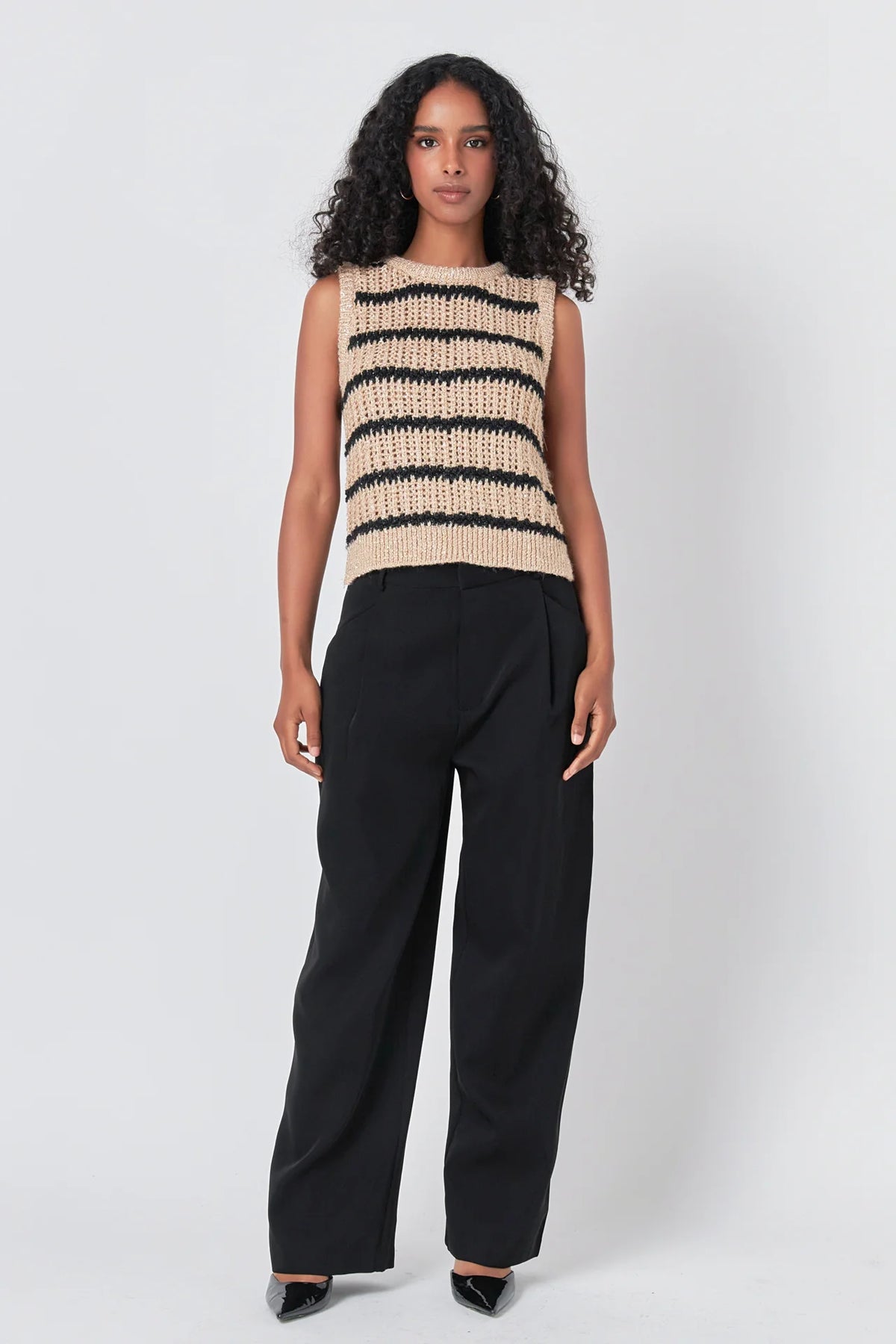 Introducing our Sequins Stripe Knit Top - the perfect addition to your sweater collection. This expertly crafted top features a unique blend of knit and crochet fabric, adding a touch of texture and trendiness. The ribbed neck and stripes give a flattering fit, while the eye-catching sequins steal the spotlight. Don't miss out on this must-have piece for any occasion - shop now and shine bright!
Care Instructions: Hand Wash Cold Do Not Bleach Do not iron Do not dry clean Do not tumble dry
79% Polyester