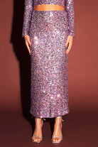 Unleash your style with our Sequins Maxi Skirt. Its straight cut and maxi length offer versatility and a flattering silhouette. Featuring intricate sequin embellishments and a side zipper for secure closure, this skirt adds a touch of sparkle and texture to any look. Crafted from high-quality fabric, it guarantees durability and will elevate your wardrobe for years to come. Don't miss out on this essential piece for any fashionista. Made of 100% Polyester for premium quality.