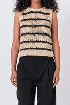 


Introducing our Sequins Stripe Knit Top - the perfect addition to your sweater collection. This expertly crafted top features a unique blend of knit and crochet fabric, adding a touch of texture and trendiness. The ribbed neck and stripes give a flattering fit, while the eye-catching sequins steal the spotlight. Don't miss out on this must-have piece for any occasion - shop now and shine bright!

Care Instructions: Hand Wash Cold Do Not Bleach Do not iron Do not dry clean Do not tumble dry

79% Polyester