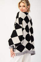 This Checkered Print Sweater Cardigan showcases a button down front, dropped shoulders, two open front pockets, banded cuffs, bubble sleeves, and a high-low design. Crafted with a blend of 50% Viscose, 30% Polyester, and 20% Nylon, it boasts an oversized silhouette for a fashionable look.