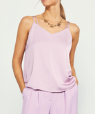 The Recycled Double Strap Cami is a versatile, sustainable garment perfect for any season, whether worn alone or layered. Its relaxed design includes adjustable straps and is crafted from a blend of recycled and traditional polyester. This staple piece is suitable for any occasion on your calendar, easily dressed up or down.

&nbsp;69% Recycled Polyester 31% Polyester